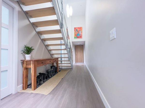 What are the innovative ways to use under-stairs space in a UK home?